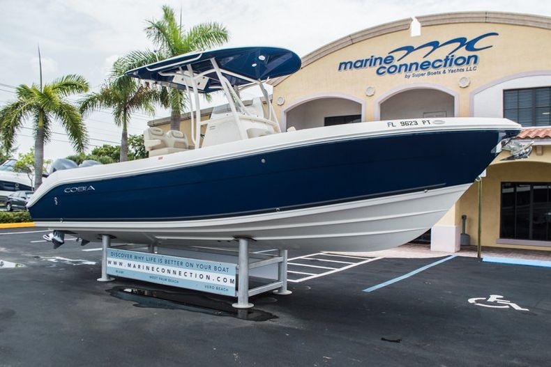 Thumbnail 2 for Used 2014 Cobia 256 Center Console boat for sale in Vero Beach, FL