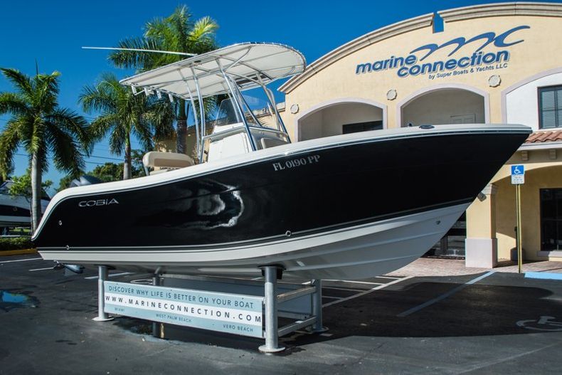 Thumbnail 1 for Used 2014 Cobia 217 Center Console boat for sale in West Palm Beach, FL