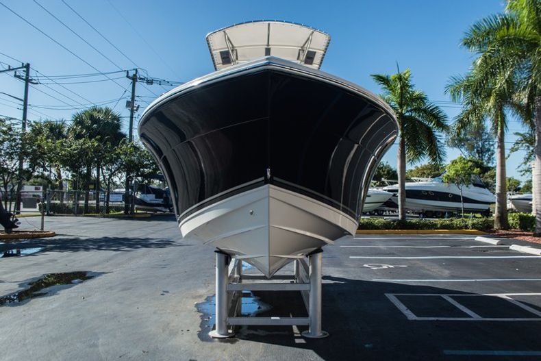 Thumbnail 2 for Used 2014 Cobia 217 Center Console boat for sale in West Palm Beach, FL