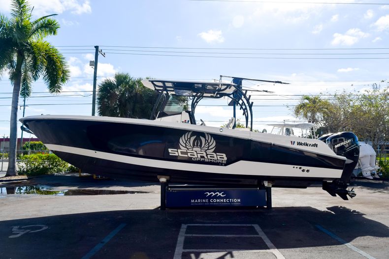 Thumbnail 4 for Used 2018 Wellcraft Scarab 302 Center Console boat for sale in West Palm Beach, FL