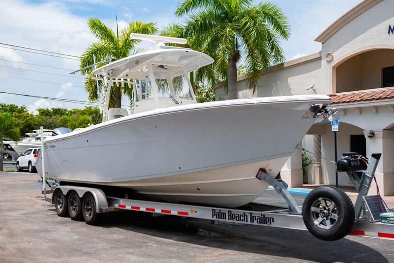 Thumbnail 1 for Used 2019 Cobia SEAKEEPER 301 CC boat for sale in West Palm Beach, FL