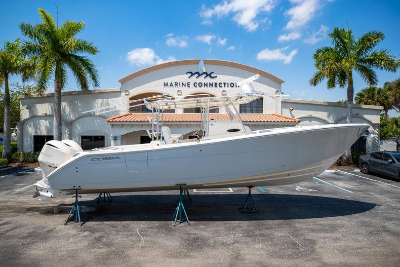 Thumbnail 1 for Used 2019 Cobia 320 CC boat for sale in West Palm Beach, FL