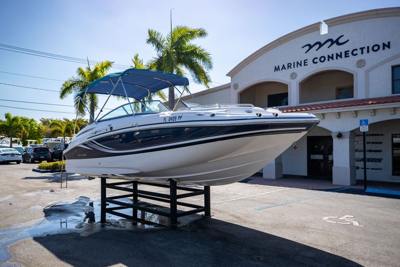 Thumbnail 1 for Used 2014 Hurricane SunDeck SD 2400 OB boat for sale in West Palm Beach, FL