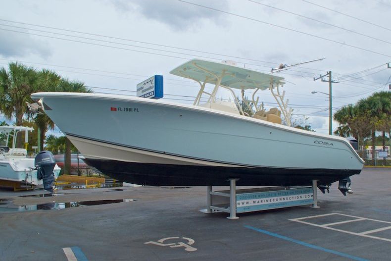 Thumbnail 4 for Used 2013 Cobia 296 Center Console boat for sale in West Palm Beach, FL