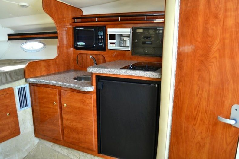 Thumbnail 105 for Used 2004 Rinker 312 Fiesta Vee boat for sale in West Palm Beach, FL