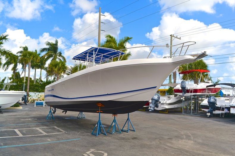 Thumbnail 5 for Used 2004 Pro-Line 30 Sport Center Console boat for sale in West Palm Beach, FL