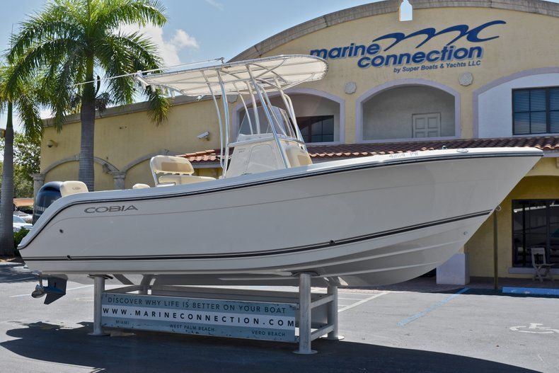 Thumbnail 1 for Used 2015 Cobia 217 Center Console boat for sale in West Palm Beach, FL