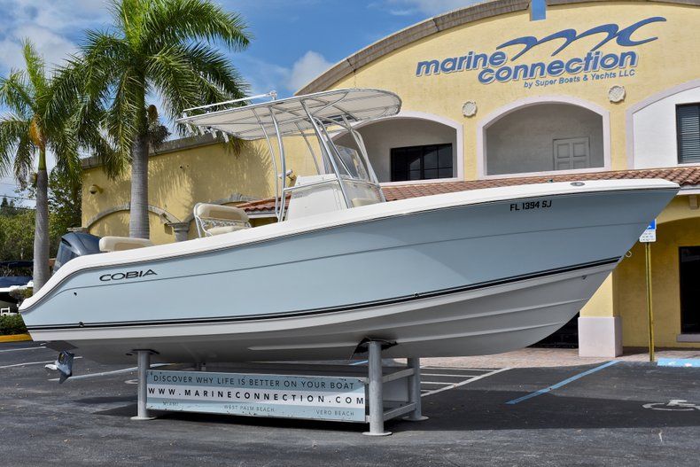 Thumbnail 1 for Used 2013 Cobia 237 Center Console boat for sale in West Palm Beach, FL