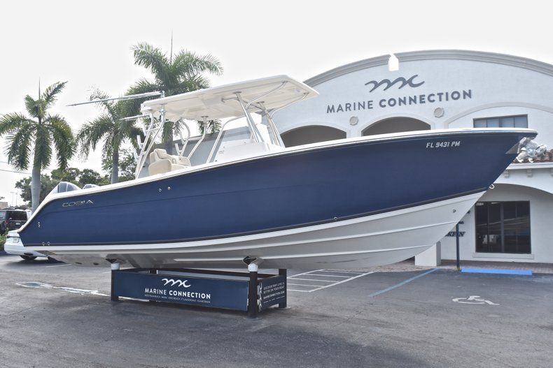 Thumbnail 1 for Used 2013 Cobia 296 Center Console boat for sale in West Palm Beach, FL