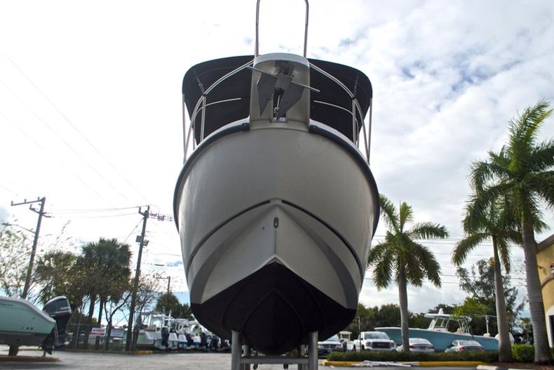 Thumbnail 2 for Used 1999 Boston Whaler 260 Outrage Center Console boat for sale in West Palm Beach, FL