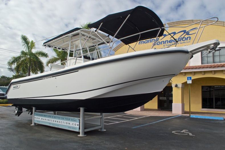 Thumbnail 1 for Used 1999 Boston Whaler 260 Outrage Center Console boat for sale in West Palm Beach, FL