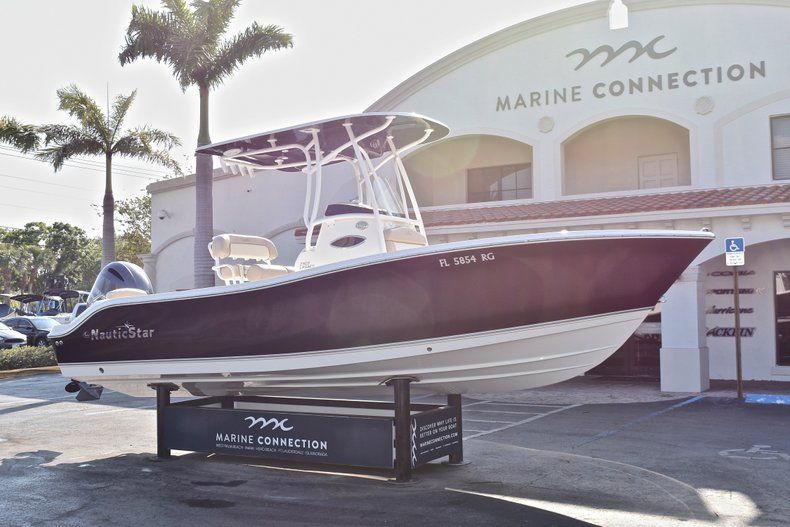 Thumbnail 1 for Used 2016 NauticStar 2302 Legacy CC boat for sale in West Palm Beach, FL