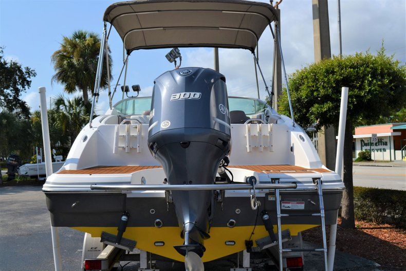 Thumbnail 4 for Used 2014 Hurricane SunDeck SD 2690 OB boat for sale in Vero Beach, FL