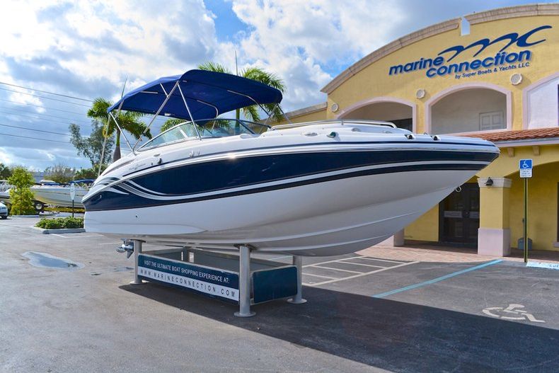 Thumbnail 1 for Used 2013 Hurricane SunDeck SD 2400 OB boat for sale in West Palm Beach, FL