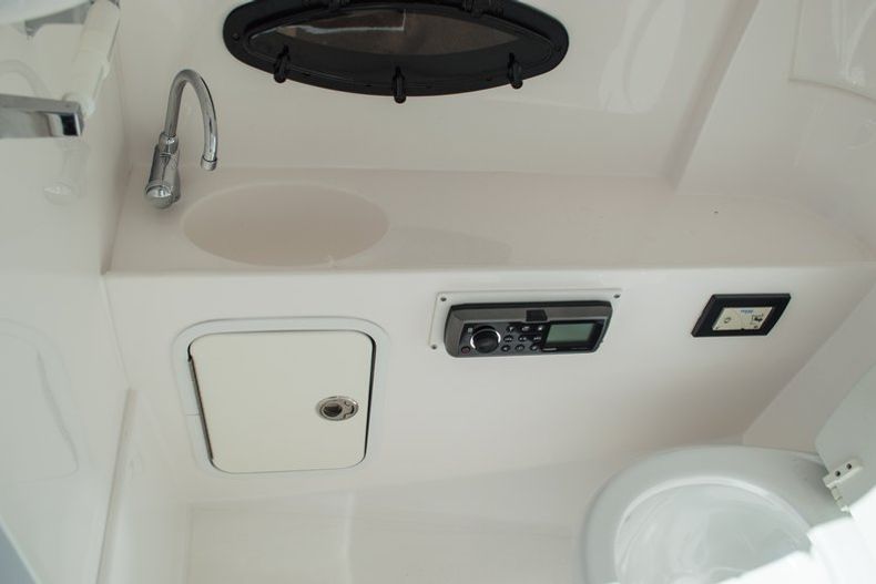 Thumbnail 29 for Used 2014 Hurricane SunDeck SD 2400 OB boat for sale in West Palm Beach, FL