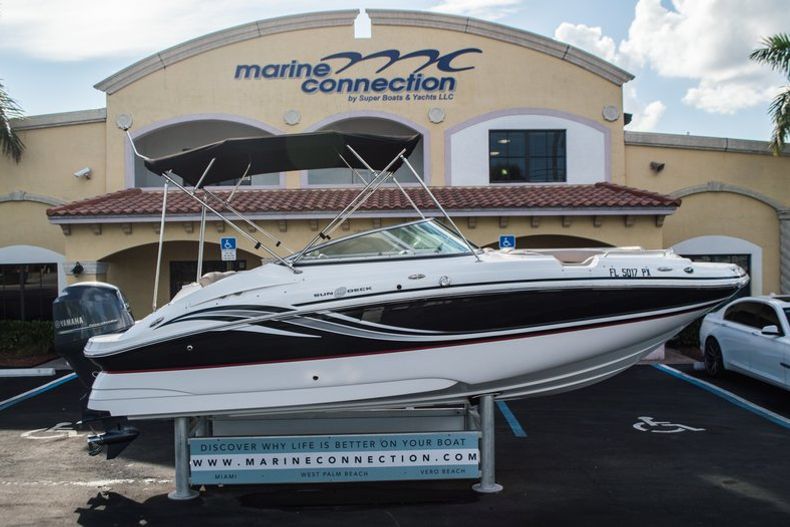 Used 2014 Hurricane SunDeck SD 2200 DC OB boat for sale in West Palm Beach, FL