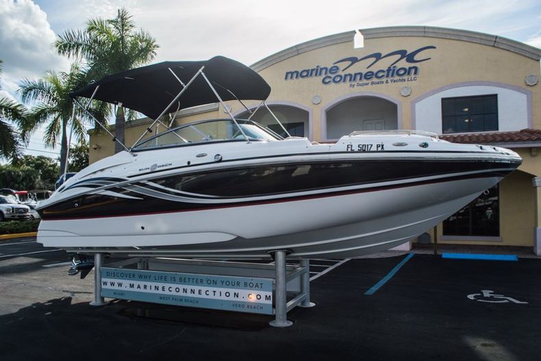 Thumbnail 1 for Used 2014 Hurricane SunDeck SD 2200 DC OB boat for sale in West Palm Beach, FL